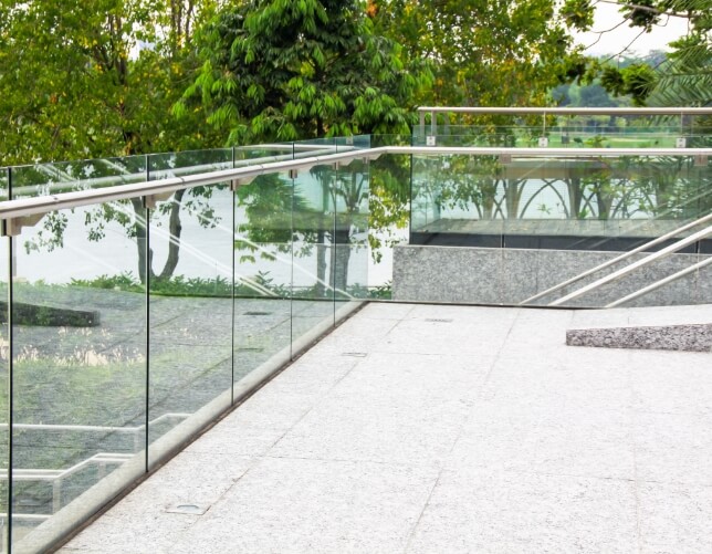 Structural glass railing systems